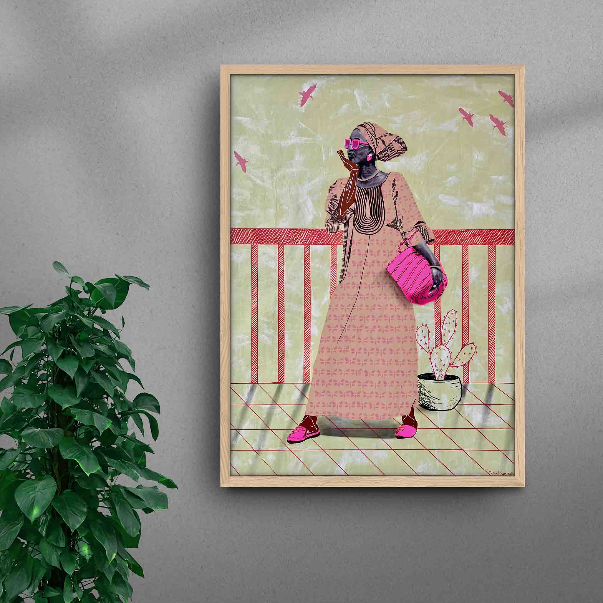 Framed A La Mode 3 black art print by Tolu Raymond, a contemporary African artwork featuring an African lady in a traditional beige dress with pink accessories, standing against a muted green background with abstract textures and red railing details, in a natural wood frame